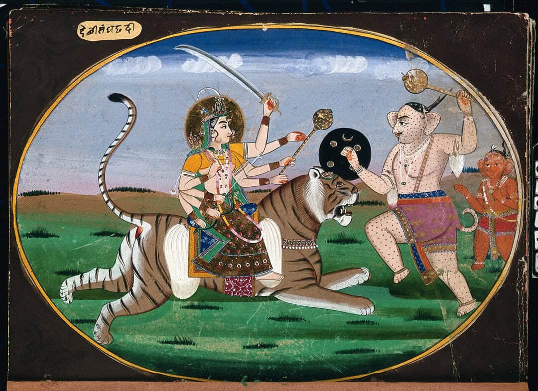 India goddess durga sitting on a tiger